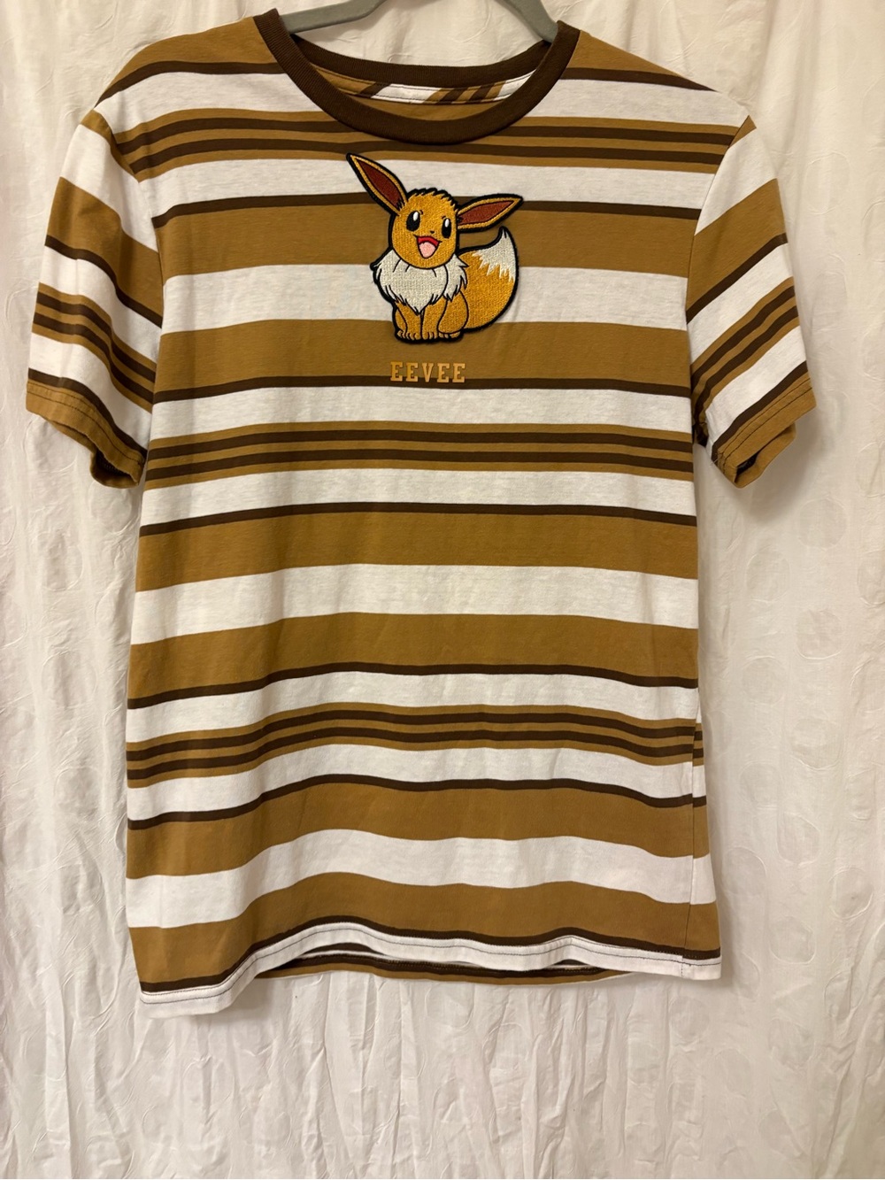 Pokemon Hybrid Eevee Tee. Size small men’s, medium women’s.